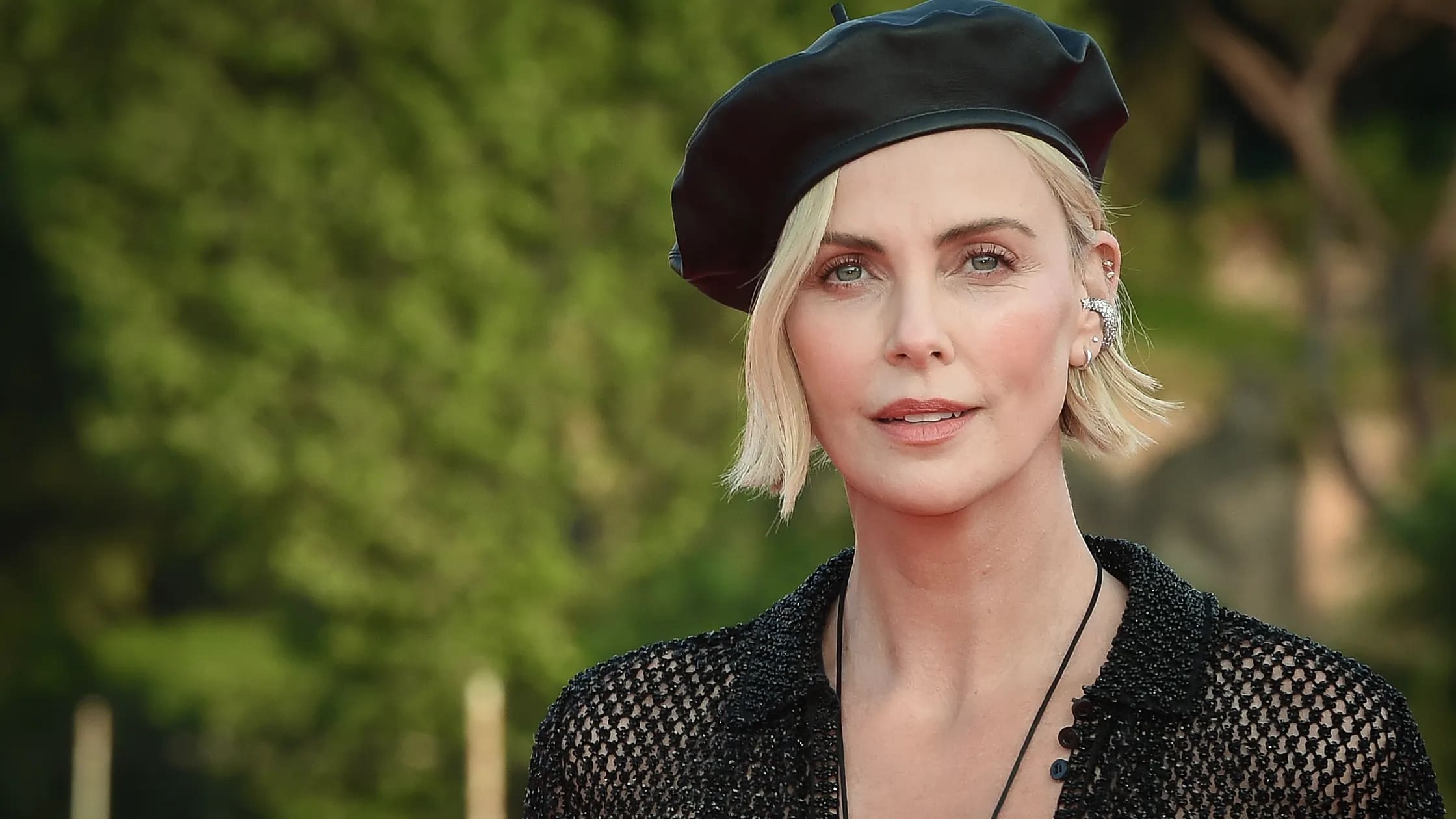 Charlize Theron On The Rumors That She’s Had Plastic Surgery: ‘B*tch, I’m Just Aging!’