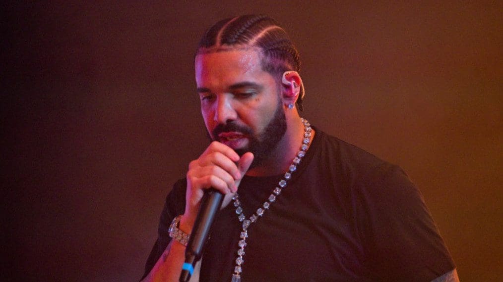 Fans Are Comparing Drake’s New Hairdo To Minnie Mouse, Smino, And More [Photos]