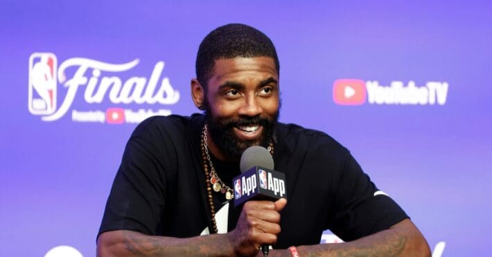Dallas Mavericks guard Kyrie Irving reacts to a question regarding LeBron James calling Irving "the most gifted player the NBA has ever seen,"