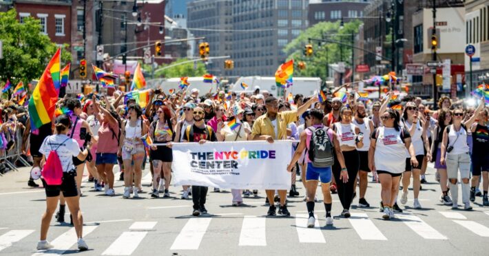 LGBTQIA+ folx celebrating pride parade.