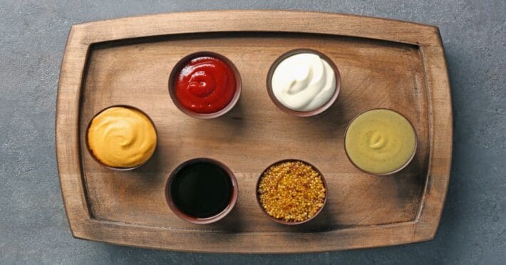 A tray of condiments and sauces