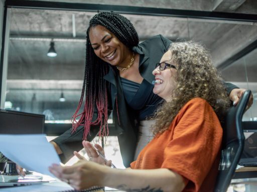 GettyImages - Manager and employee working in office - stock photo