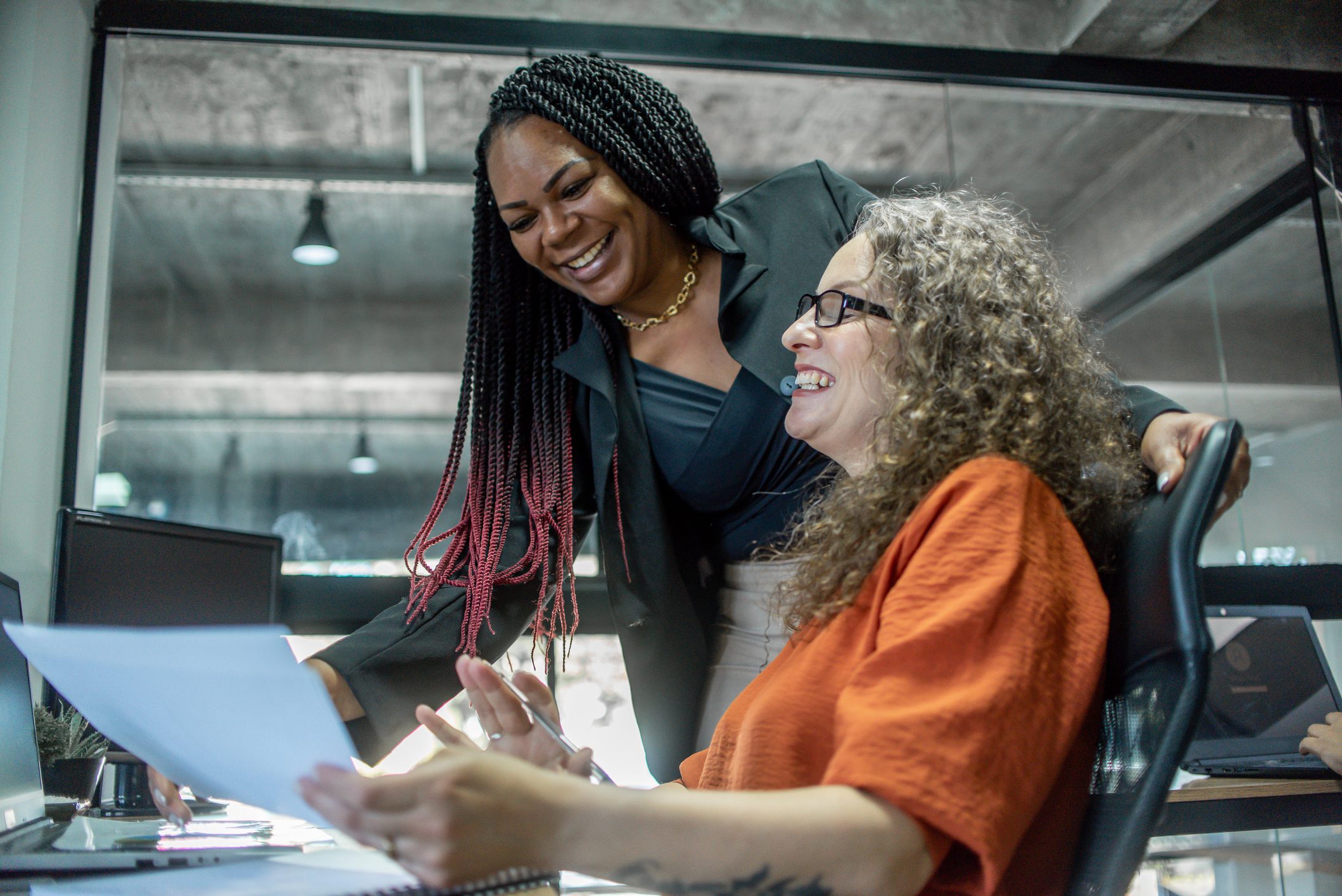 GettyImages - Manager and employee working in office - stock photo