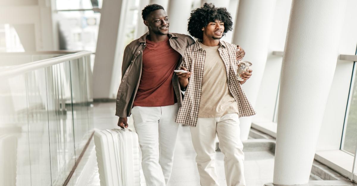 Couple walking in terminal.