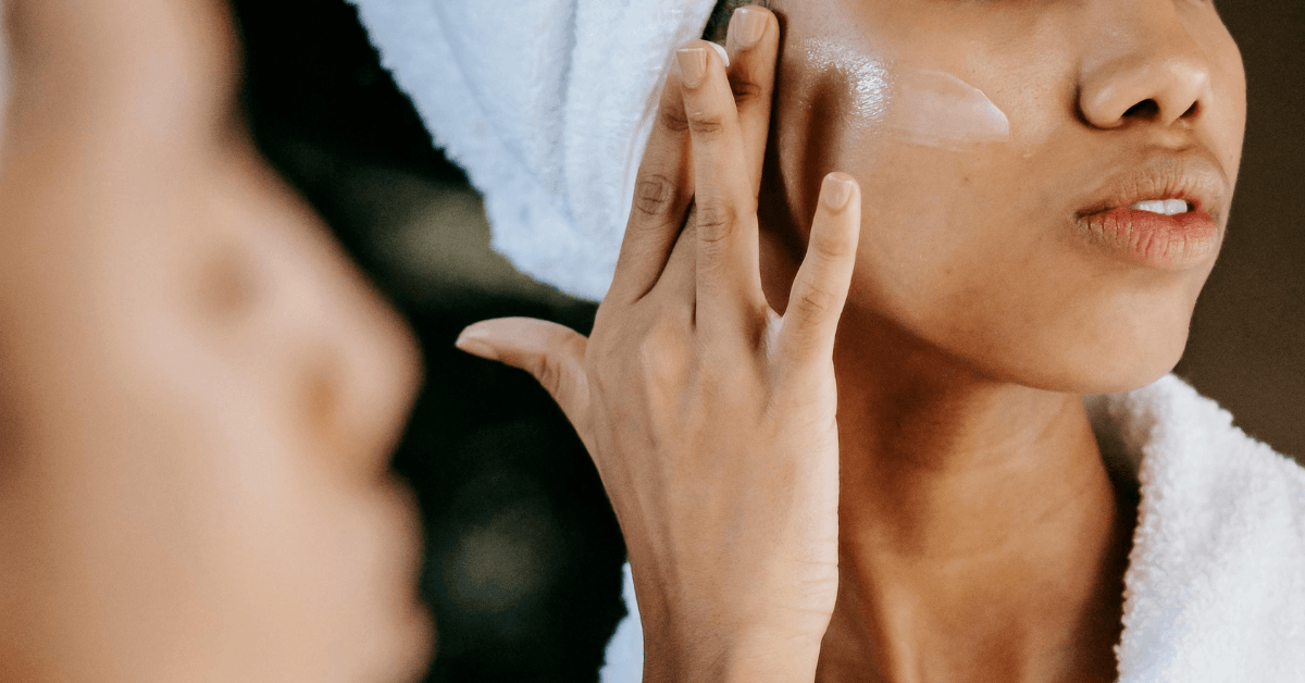 Woman applying skincare