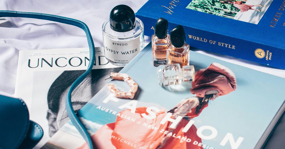 A collection of fragrances on fashion magazines