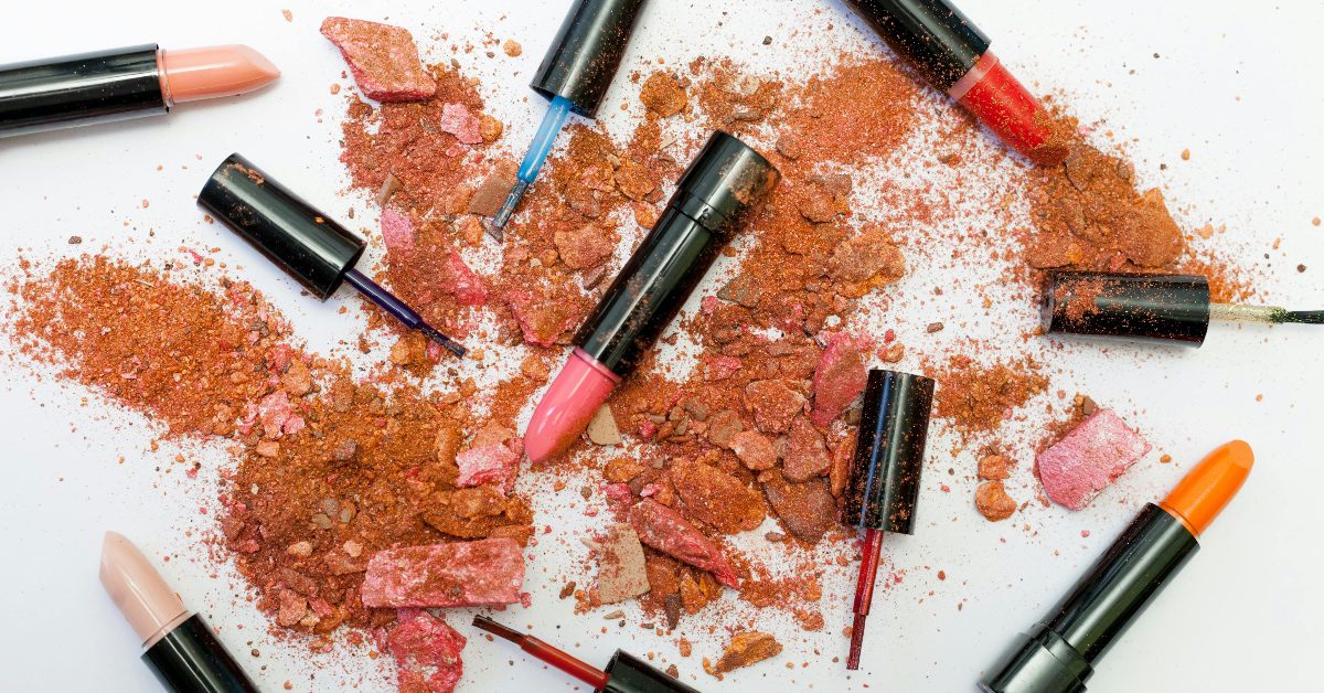 Lipsticks and crushed makeup powders